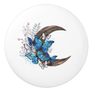 Blue butterflies on wooden crescent ceramic knob