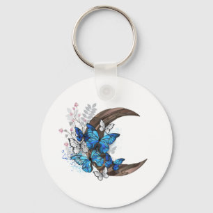 Blue butterflies on wooden crescent keychain