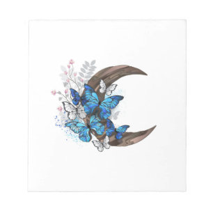 Blue butterflies on wooden crescent notepad