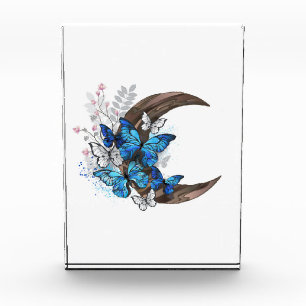 Blue butterflies on wooden crescent photo block