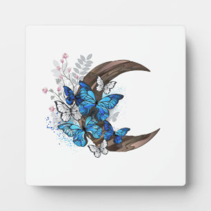 Blue butterflies on wooden crescent plaque