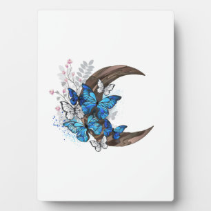 Blue butterflies on wooden crescent plaque