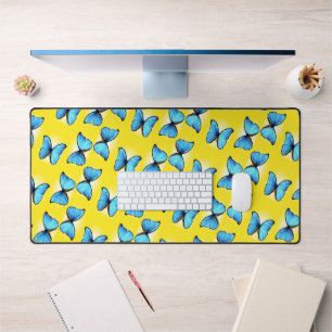 Blue butterflies pattern on yellow desk mat