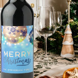 Blue Christmas Baubles Twinkling String Lights  Wine Label<br><div class="desc">Our personalized wine label will add a touch of elegance and seasonal cheer to your Christmas festivity. This label features a captivating blue background adorned with gold and green Christmas ornaments. The twinkling lights add a festive sparkle, illuminating the heartfelt message, "Merry Christmas". This label is not just a sticker...</div>