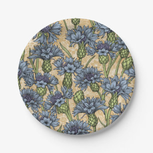 Blue cornflowers, wild flowers on honney yellow paper plate