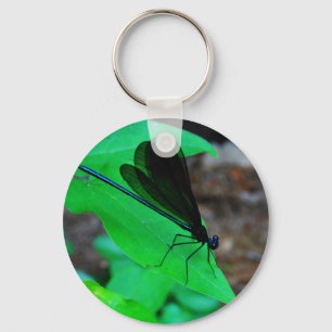 Blue Damselfly on a green leaf. Keychain