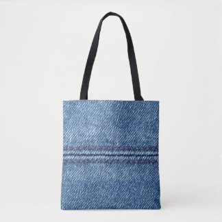 Blue denim background close-up (macro) tote bag