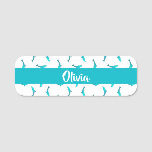 Blue dolphins on white name tag