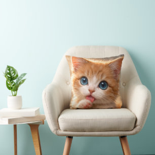 Blue-Eyed Paw licking Kitten Throw Pillow