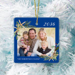 Blue Family Photo Christmas Beach Starfish  Ceramic Ornament<br><div class="desc">This beach inspired Christmas ornament with blue background and white text makes a great annual holiday keepsake, easily customized for a unique gift with the photo and text templates. Holiday watercolor sprigs of holly, pine, and starfish in two corners frame the photo on both sides. Please contact me through Zazzle...</div>