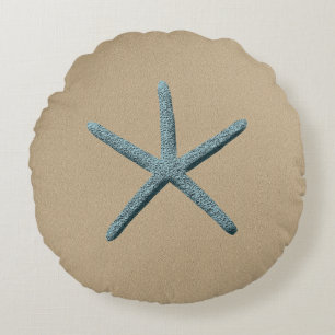 Blue Finger Starfish On Sand Coloured Background Round Pillow