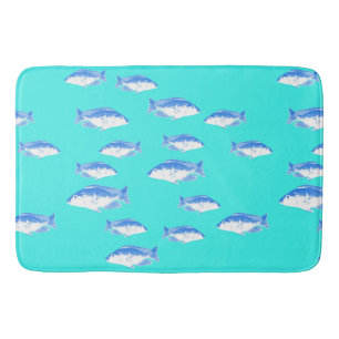 Blue fish on turquoise bath mat