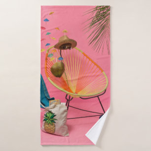 Blue flip-flop beside chair bath towel