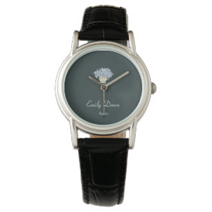 Blue flowers in vase grey watch