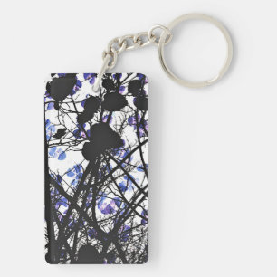 Blue flowers on winter tree concept digital art keychain