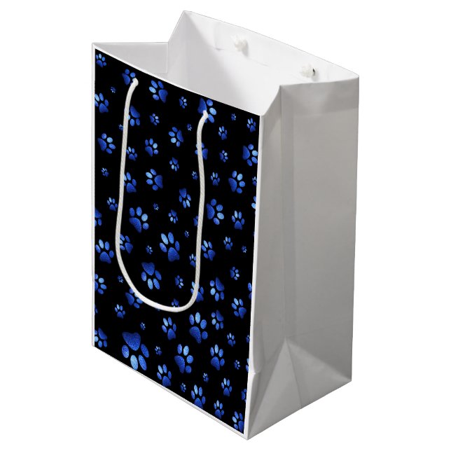 Blue glitter dog paw pattern medium gift bag (Front Angled)