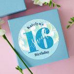 Blue Glitter Sweet 16 Birthday Balloons Script Classic Round Sticker<br><div class="desc">“Happy Sweet 16”. Celebrate her birthday with this stunning, simple, festive, modern, personalized round sticker. Bold, graphic, deep teal blue typography and white handwritten script overlay a teal blue glitter “16”, aqua green blue balloons and gold sparkly string lights on a soft light aqua blue background. Personalize the custom text...</div>