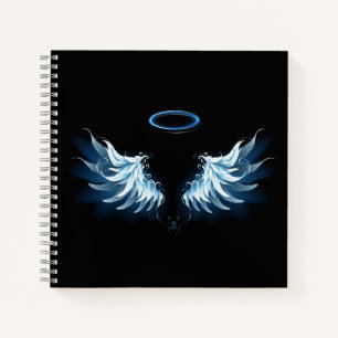 Blue Glowing Angel Wings on black background Notebook
