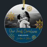 Blue Gold Snowflakes First Christmas Engaged Ceramic Ornament<br><div class="desc">Bright Christmas holiday photo ornament with gold snowflakes and navy blue background for engaged couple. Personalize it by adding your names. It's a good gift for newly weds or for a fiance/fiiancee.</div>