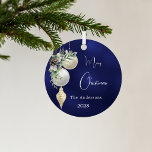 Blue gold white baubles Christmas Metal Ornament<br><div class="desc">A blue uneven coloured background. Decorated with white and gold baubles and some greenery and a pine cone.  Personalize and add your name,  year.  Text: Merry Christmas</div>