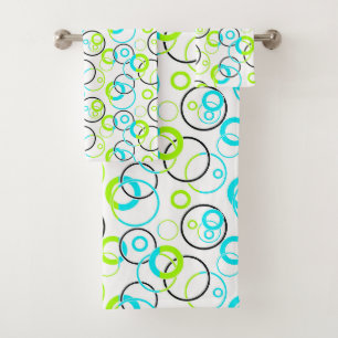 blue green and black rings and circles on white bath towel set