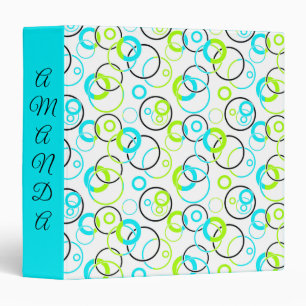 blue green and black rings and circles on white binder