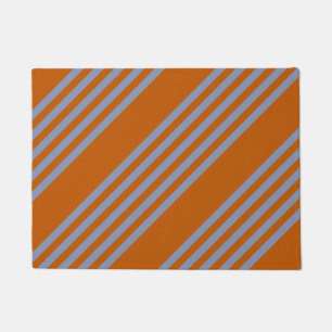 Blue-grey and burnt orange five stripe pattern doormat