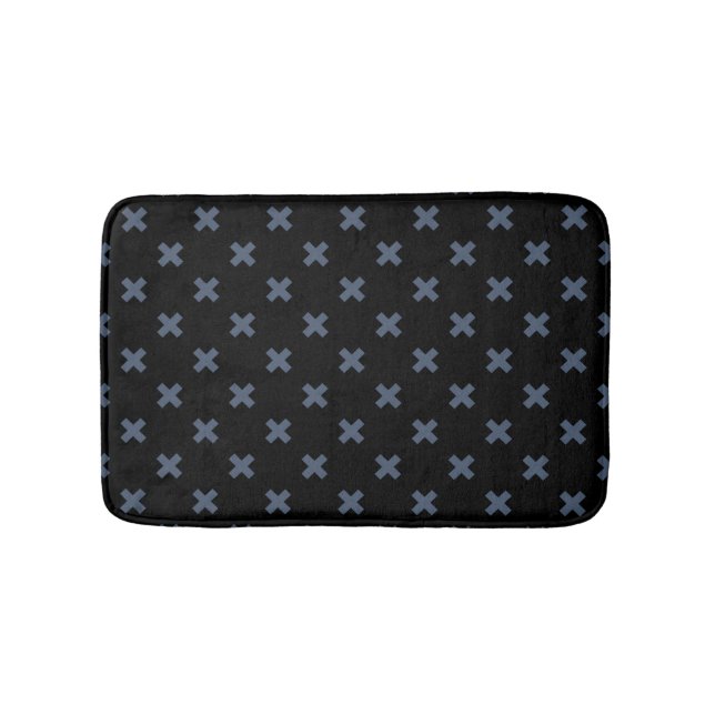 Blue-grey cross stitches on black bath mat (Front)