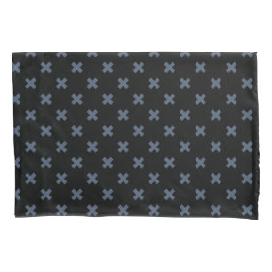 Blue-grey cross stitches on black pillowcase