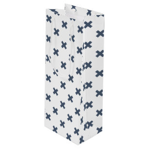 Blue-grey cross stitches on white wine gift bag
