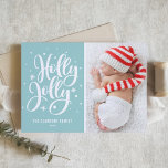 Blue Holly Jolly Hand Lettering Baby Photo Holiday Card<br><div class="desc">Festive Holly Jolly Hand-Lettered Photo Holiday Card | Send festive holiday greetings to family and friends with this customizable holiday flat card. It features a hand-lettered "holly jolly" overlay with snow and snowflakes accent. Customize by adding your favourite photo. Matching items are available.</div>