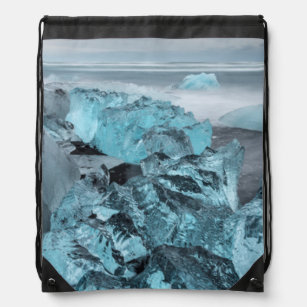 Blue ice on beach seascape, Iceland Drawstring Bag
