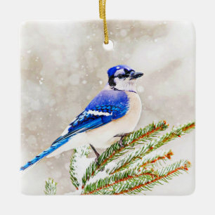 Blue jay in a pine tree with snow ceramic ornament