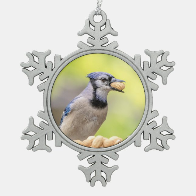 Blue jay with a peanut snowflake pewter christmas ornament (Front)