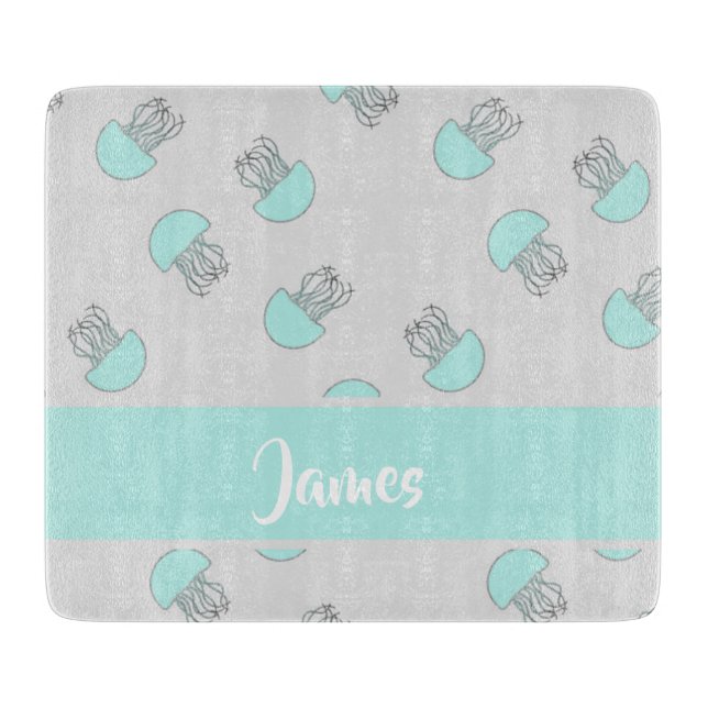 Blue jellyfish on grey cutting board (Front)