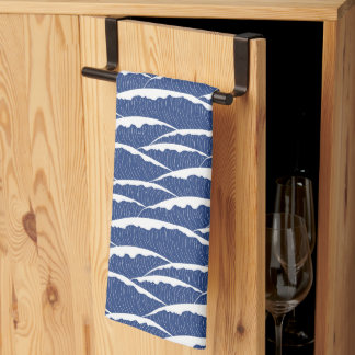 Blue kitchen towel with illustrative waves pattern