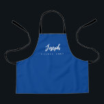 Blue Little Chef Script Name personalized Kids Apron<br><div class="desc">Make your little chef feel extra special with our Blue Little Chef Script Name Personalized Kids Apron. This apron is designed to provide a simple, chic, and elegant look, featuring stylish script typography for personalizing the name. The purple background colour adds a touch of vibrancy and fun, perfect for engaging...</div>