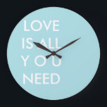 Blue Love is All You Need Custom White Text Large Clock<br><div class="desc">Blue and white "All you need is love" custom text template personalized round wall clock with quotes. Custom typography wall clock template, by red_dress, featuring the white text "Love is All you Need" on a blue customizable background. Easily personalize written text wall clocks with your favourite colours and quotes. Click...</div>