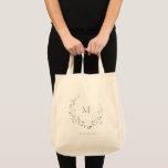 Blue Monogram Boho Wildflower Wreath Bridesmaid Tote Bag<br><div class="desc">Monogrammed initial framed by elegant delicate watercolor wildflower design, Pastel palettes of soft yellow, off white, sage green, dusty blue, and botanical greenery, with personalized name, simple and romantic. Great monogrammed gift for bridesmaid at modern rustic party, boho country garden wedding party in spring and summer. See all the matching...</div>