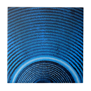 Blue music speaker and sound waves tile