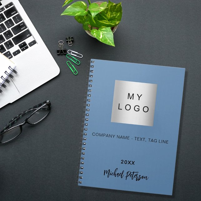 Blue name script business logo notebook (Creator Uploaded)