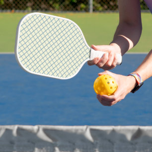 Blue net mesh on white pickleball paddle