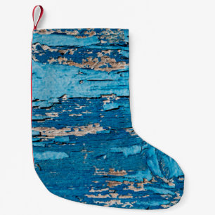Blue old wooden background  small christmas stocking