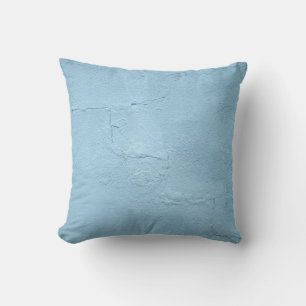Blue painted concrete wall during daytime throw pillow