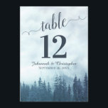 Blue Pine Trees Wedding Table Number Card Large<br><div class="desc">These beautiful wedding table number cards feature an elegant yet rustic design with a fancy script calligraphy title and a backdrop of blue mountain pine trees shrouded in mist or fog. These cards are larger than standard making it easy for your guests to find their tables. Perfect way to make...</div>