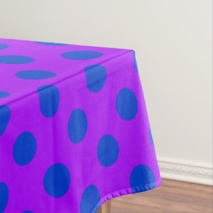 Blue polka dots on purple tablecloth