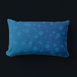 Blue rectangular pillow with a pattern of varying<br><div class="desc">Blue rectangular pillow with a pattern of varying-sized circles,  creating a playful and calming design. The background appears in a solid blue shade.</div>