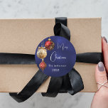 Blue red gold baubles Christmas Classic Round Sticker<br><div class="desc">For a Christmas party favours or gift wrapping. An navy blue uneven coloured background. Decorated with red and gold baubles.  Personalize and add your name,  year.  Text: Merry Christmas</div>