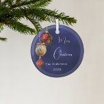 Blue red gold baubles Christmas Glass Ornament<br><div class="desc">An navy blue uneven coloured background. Decorated with red and gold baubles.  Personalize and add your name,  year.  Text: Merry Christmas</div>