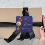 Blue red gold baubles Christmas Square Sticker<br><div class="desc">For a Christmas party favours or gift wrapping. An navy blue uneven coloured background. Decorated with red and gold baubles.  Personalize and add your name,  year.  Text: Merry Christmas</div>